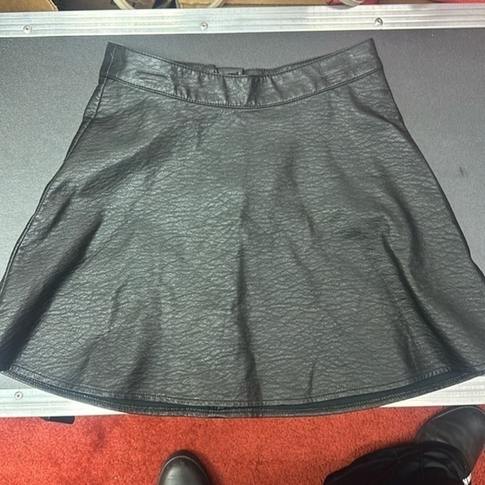 Divided women’s faux leather black mini skirt size 4